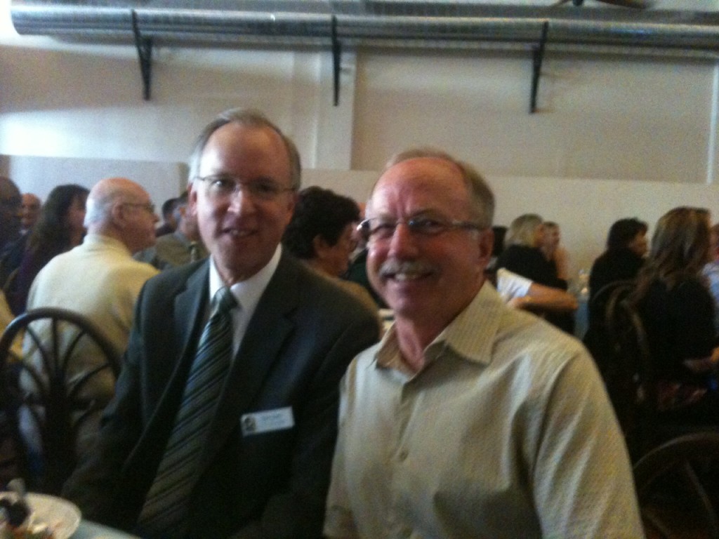 Dennis Klimisch and the new city manager share ideas for the city
