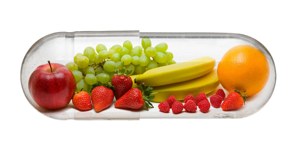 Image of fresh fruit in medicine capsule to highlight Pharm Fresh, an urban farming initiative.